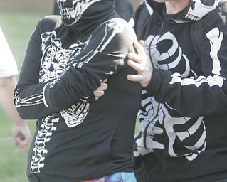 William D. Lewis|The Vindicator Runner Abbie Morrow gets encouragement from Joe Ragan before the start of Peace Race Sunday. they are from Poland She was running the race.