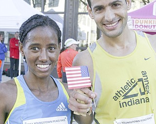 William D. Lewis|The Vindicator Peace Race 1rst place winners Mumis Ekoba and Aziz Atmani at end of race.