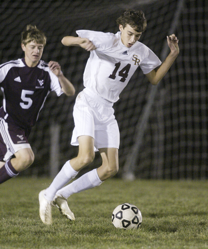 William D Lewis The Vindicator  South Range's  #1Aaron Beabout keeps the ball from Waterloo's Keegan Moss during Tuesday action at SR.