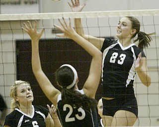 William D. Lewis|The Vindicator Canfield'sHannah Milstead #23 shoots as Salem's Lindsey Foster defends. At left is Canfield's Ellie Rafoth.