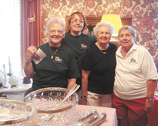 Upton House garage sale planned: Liz Clark, Sandra Sarsany, Dottie Sabey and Rita Hoppe Darling help prepare for the annual Upton House garage sale, planned for 9 a.m. to 4 p.m. Nov. 18 and 19. A variety of items will be on sale in the garage, kitchen and large dining room. The house is at 380 Mahoning Ave., downtown Warren. On Dec. 2, the Upton Open House will take place from 6 to 8 p.m. Decorated in holiday splendor, the house will be open to the public at no charge. On Dec. 9 through 11 story time with Mrs. Claus, $10 per child, will be available. Reservations are required by Nov. 30. Reservation forms and more information can be found online at www.uptonhouse.org, or call 330-395-1840. 