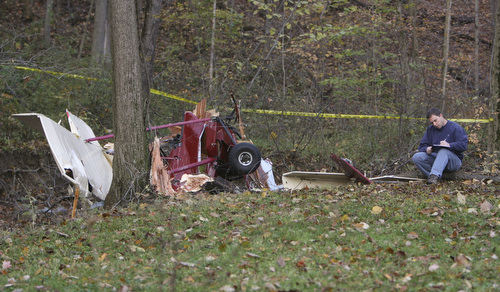ROBERT K. YOSAY | THE VINDICATOR || Pilot Ronald Catchpole, 54, of King Graves Road, Vienna, was seriously injured when his experimental  1990 Pieton Pole Air Camper crashed on Mount Pleasant Road around 5 p.m. Saturday.