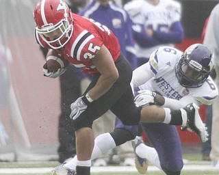 ROBERT K. YOSAY | THE VINDICATOR..#35  YSU  Jamaine Cook breaks thru defender James Kieron as he breaks down the sideline during second quarter action..YSU vs Western Illinois - homecoming at YSU and a win 56-14 ......-30