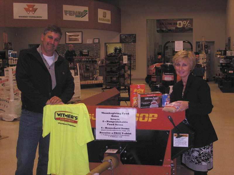 ‘Spread the Cheer’: Witmer’s Inc., 39821 Salem Unity Road, Salem, has started its third annual “Spread the Cheer” food drive. Kicking off this year’s drive are Nelson Witmer and Grace Styer, above. The goal is to fill the Pequea 80-bushel manure spreader as many times as possible for Thanksgiving and then again for Christmas. Anyone who takes in at least six nonperishable food items or six household items, such as paper towels, toilet tissue or soap, etc., will receive a Witmer’s T-shirt while supplies last. Limit one shirt per person per visit. This will help replenish the shelves of several local food banks.