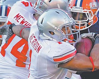 Ohio State running back and Warren Harding grad Dan Herron (1), who was suspended twice by the NCAA this year for accepting improper benefi ts, is now adored by fans because the team is winning and he’s picking up big yardage.