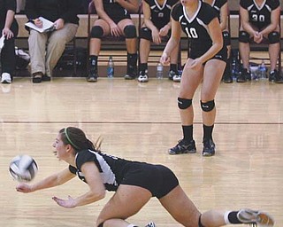 Canfield senior Abby Malsch dives for the ball during the second game of the Division II regional
volleyball semifinal against Beaumont on Thursday in Stow. The Cardinals’ season came to an
end at the hands of the Blue Streaks, who won 3-0.
