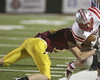 ROBERT K. YOSAY | THE VINDICATOR --..Mooneys #24 Ryan Farragher ties up #7 Dan May for the Indians as he pushes him out of bounds short of a first down..Cardinal Mooney Cardinals vs Canal Fulton Northwest Indians at Stambaugh Stadium in the Regional Quarterfinals .--30-..(AP Photo/The Vindicator, Robert K. Yosay)