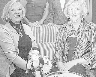 William D. Lewis | The Vindicator: Awaiting the Holiday Brunch and Sweet Shoppe as well as “Magic of the Angels Christmas” are, in front, from left, Judy Kimmel and Jacie Ridel, and in back, Jeannine Hodge and Carol O’Neill.