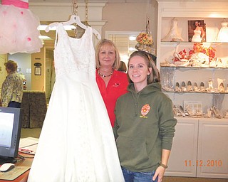 Operation Wedding Gown: Treasured Moments Bridal & Formal, 80 Boardman-Poland Road, Boardman, is participating in Operation Wedding Gown on Nov. 11 in honor of Veterans Day. The event is part of Brides Across America, a national charitable organization that provides free gowns for military brides. Military fiancées are invited for interviews and refreshments that day. To qualify, they must be engaged and be on active duty in the military or have a fiancé on active duty in Iraq, Afghanistan, Bahrain, Libya or Japan. All military brides must show ID, copy of deployment papers, orders or other qualifying proof. Ann Hough, above, drove from Dublin, Ohio, to claim her free wedding gown during last year’s event. For more information call Treasured Moments at 330-726-9144 or visit www.bridesacrossamerica.com.