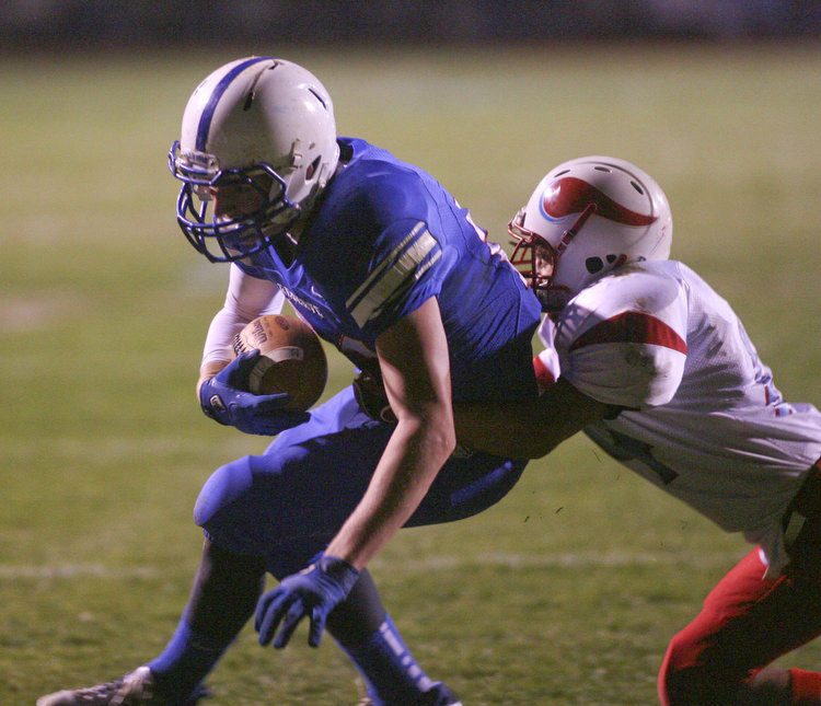 ROBERT  K.  YOSAY  | THE VINDICATOR --..#24 Thomas Benyo almost breaks a tackle by Mato Vunak as he dives for the endzone - he was inches short and the Blue Devils scored on their next Possesion..Regional quarter final at Western Reserve Stadium - Western Reserve Blue Devils  VS   Villa Angela St Joesph Vikings.--30-..(AP Photo/The Vindicator, Robert K. Yosay)