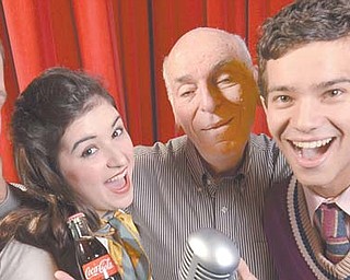 Director Frank Castronovo (center, rear), with “1940s Radio Hour” cast members Joey Alvey, Natalie Martzial and Connor Bezeredi.