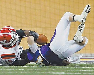 Youngstown State’s Daniel Stewart (19) sacks Northern Iowa quarterback Jared Lanpher in Saturday’s MVFC game at the UNI-Dome in Cedar Falls, Iowa. Despite losing 21-17, the Penguins’ defense is starting to look like a playoff -caliber unit.