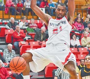 Youngstown State’s Damian Eargle dunks during a game last season against Milwaukee at Beeghly Center. Eargle will be one of the Penguins’ most-counted on players for the 2011-12 season, which tips off on Saturday night at
Samford.