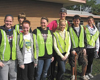 Keeping Kirk Road clean: Members of the Fitch Interact Club and the Rotary Club of Austintown met recently for their semiannual cleanup of Kirk Road from Route 46 to Whispering Pines Drive. This marked the 11th year for the project, in conjunction with the Mahoning County Green Team. From left to right, front, are Interact members Megan Miller, Spencer Skolnick, Samantha Eash, Lauren Ferguson and Zerek Bell, and David Dalvin of Canfield, and in back row are Tom Frederick and Alex DiFrancesco.