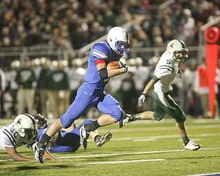 ROBERT K. YOSAY | THE VINDICATOR --..Free and Clear - as #2 Donnie Bolton breaks free for a TD #10 Marcush Johnson falls and #5 Aaron Enold is too far to stop them - during third quarter action Regional quarter final at Western Reserve Stadium - Western Reserve Blue Devils VS Malvern Hornets at Louisville.--30-..(AP Photo/The Vindicator, Robert K. Yosay)