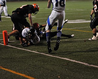 First Quarter Touchdown by Drevon Green #20 of the Youngstown Christian Academy Eagles as they take the lead 7-0 #18 Ryan Coyier of the Eagles also pictured.#42 Shadyside Tigers Brooks Ramsey RS of photo