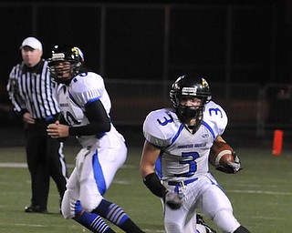 #3 RB Anythony Abeid takes the hand off from QB #10 Emmit Underwood as he scrambles towards another YCA touchdown in the 2nd quarter..
