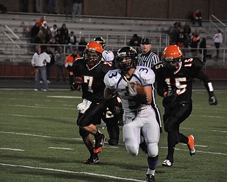 YCA RB #3 Anythony Abeid sprints up the sideline towards the endzone with Shadyside defenders Levi Spencer #7 and Mason Gulash #15 on his heels..