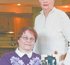 Loretta Ekoniak, left, of Canfield and Susan Summers of West Middlesex, Pa., coauthored a book called “Images of America: Slovaks of the Greater Mahoning Valley.” They have scheduled two book signings in the Valley.