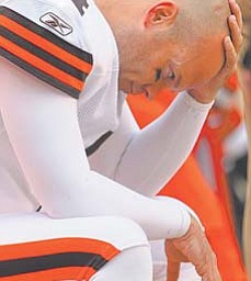 Browns kicker Phil Dawson contemplates after missing a 22-yard field goal in the fourth quarter of Sunday’s game in Cleveland. The Rams won 13-12.