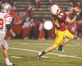 Senior wide receiver Ryan Farragher, shown here in a first-round playoff game against Canal Fulton Northwest, made two clutch catches on Cardinal Mooney’s final drive, helping to set up the game-winning field goal.