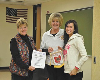 Helping to get coats for kids: Boardman High School’s National Honor Society recently contributed $300 to the Boardman Lions Club’s Coats for Kids Drive. The money, the club’s largest donation to date, helped the Lions buy 52 winter coats for 26 area families. From left to right are Lions Betsy Koch and Kathy Collins and NHS President Faith Marsco. Other NHS projects this year were Coins for Kids for Akron Children’s Hospital, tutoring and volunteering at Angels for Animals. The club also plans to participate in the Lions’ White Cane Collection Day, Nov. 23. Mary Beth Shobel, a Boardman Lion, advises the club.