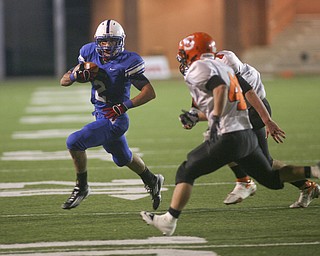 ROBERT K. YOSAY | THE VINDICATOR --..Regional Finals WR #2 Donnie Bolton heads for the sidelines outrunning Shadyside Defenders #43 DJ Shoemaker and #1 Austin Dorris as he sets up for WR to score on the next play in the second quarter--30-..(AP Photo/The Vindicator, Robert K. Yosay)