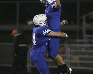 ROBERT K. YOSAY | THE VINDICATOR --..Regional Finals - #2 WR Donnie Bolton celebrates after recovering a blocked kick that he ran in for a touch down making it 28-7 just before half - #4 Mitch Shahaden is with him.--30-..(AP Photo/The Vindicator, Robert K. Yosay)