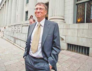 Microsoft co-founder and chairman Bill Gates leaves the Frank E. Moss federal courthouse in Salt Lake City on Monday after testifying in a $1 billion antitrust lawsuit brought by Novell Inc.