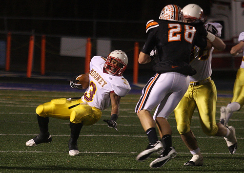 FOOTBALL - (3) Roosevelt Griffin cuts hard Friday night in Uniontown. - Special to The Vindicator/Nick Mays