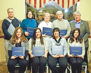 Struthers Rotary Club celebrated its 56th anniversary recently at Dona Vito’s Italian Grille, and eight people received the Paul Harris Fellow. The designation, named after Rotary’s founder, is funded by a donation to the Rotary Foundation and is awarded to members whose lives exemplify the humanitarian and educational objectives of the club. From left, in the back row, Struthers Rotarian Tom Baringer presented the awards to Lisa Baringer, Patricia Krake, Mickey Morell and Al Sauline, and, front row, Stephanie Lanterman, Catherine Cercone, Kristina Daley and Alyssa Baringer