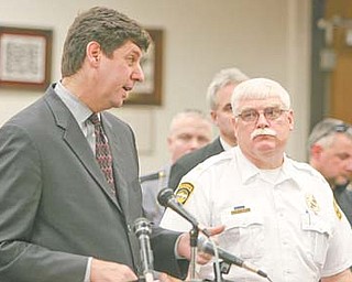 Steven Dettelbach, left, U.S. attorney for the Northern District of Ohio, and Warren Police Chief Tim Bowers were among law-enforcement participants on hand Tuesday for an update in Warren on the Violence Gun Reduction and Interdiction Program.