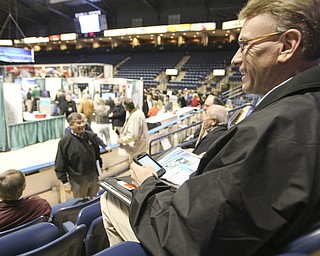 ROBERT K. YOSAY | THE VINDICATOR..Jack Trettel Account manager with Matheson Valley out of Pittsburgh is connected as he worked the Expo - "The YOUNG 2011 Conference and Expo Ñ the first Utica shale play conference in the state of Ohio Ñ is a dedicated B2B conference in which national and local companies can exhibit their products and interact with key players in the burgeoning Utica and Marcellus supply chain. at the Covelli Centre .. .-30