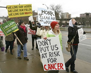 ROBERT K. YOSAY | THE VINDICATOR..While thousands learned about the Utica Shale industry inside the Covelli Centre, about 100 anti-fracking protesters from around Ohio braved the snow and cold to tell their side of the story.."The YOUNG 2011 Conference and Expo Ñ the first Utica shale play conference in the state of Ohio Ñ is a dedicated B2B conference in which national and local companies can exhibit their products and interact with key players in the burgeoning Utica and Marcellus supply chain. at the Covelli Centre .. .-30