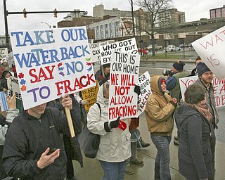 ROBERT K. YOSAY | THE VINDICATOR..While thousands learned about the Utica Shale industry inside the Covelli Centre, about 100 anti-fracking protesters from around Ohio braved the snow and cold to tell their side of the story.."The YOUNG 2011 Conference and Expo Ñ the first Utica shale play conference in the state of Ohio Ñ is a dedicated B2B conference in which national and local companies can exhibit their products and interact with key players in the burgeoning Utica and Marcellus supply chain. at the Covelli Centre .. .-30