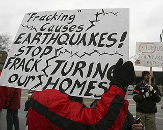 ROBERT K. YOSAY | THE VINDICATOR..While thousands learned about the Utica Shale industry inside the Covelli Centre, about 100 anti-fracking protesters from around Ohio braved the snow and cold to tell their side of the story.."The YOUNG 2011 Conference and Expo Ñ the first Utica shale play conference in the state of Ohio Ñ is a dedicated B2B conference in which national and local companies can exhibit their products and interact with key players in the burgeoning Utica and Marcellus supply chain. at the Covelli Centre .. .-30