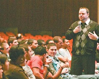 James DeLucia , a clinical counselor at Martin P. Joyce Juvenile Justice Center in Youngstown, explains the consequences of sexting to Austintown Fitch High School students. Representatives of the justice center and Austintown Police Department talked to students Wednesday about legal and emotional dangers.