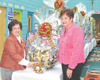 Sister Charlotte Italiano, left, principal of Ursuline Preschool and Kindergarten, and Mary Ann Critell, assistant principal and kindergarten teacher, are busy preparing for the school’s 23rd Annual Once Upon a Christmas Craft Show. More than 100 crafters, decorations, baked goods and a raffle for numerous large gift baskets are among the features of the show, from 9 a.m. to 4 p.m. Saturday at the Ursuline Center, 4300 Shields Road, Canfield. Admission and parking are free. For more information call 330-792-4150 or visit UrsulinePreschoolandKindergarten.org.