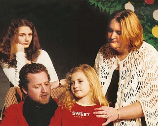From left, Miranda Canacci, Chuck Kettering, Gillian Canacci and Brittiani Ketcham in a scene from “The Most Beautiful Star,” one of three one-act plays that comprise “In the Spirit of Christmas” at The Victorian Players Theater.