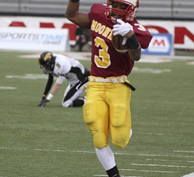 Roosevelt Griffin barely steps out of bounds on a 36 yard run. Youngstown Cardinal Mooney won their 8th championship as they beat the Shawnee Braves in Fawcett Stadium 21-14. (AP Photo/The Vindicator, Robert K. Yosay)