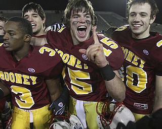 Youngstown Cardinal Mooney won their 8th championship as they beat the Shawnee Braves in Fawcett Stadium 21-14. (AP Photo/The Vindicator, Robert K. Yosay)