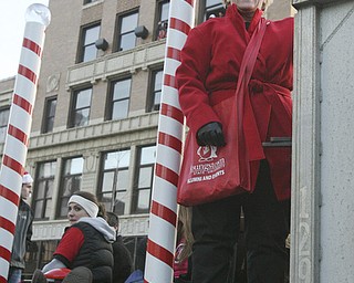 JESSICA M. KANALAS | THE VINDICATOR..YSU president Cynthia Anderson rides on a truck during the holiday parade in Downtown Youngstown.