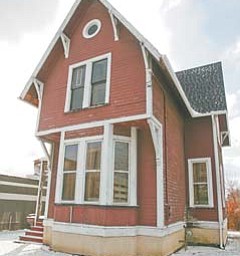 The Thompson-Sacherman House on Lincoln Avenue has been cited by the city for property maintenance violations. YSU will demolish the house, citing its deteriorated condition, the cost to repair and renovate it and a lack of an identified educational use for it.