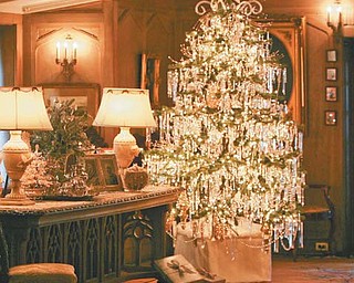 The library features a Christmas tree decorated with hundreds of new and antique glass and
crystal prisms.