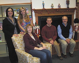 Leetonia Community Public Library, 181 Walnut St., is sponsoring an open house from 1 to 4 p.m. Saturday. Snacks and punch will be served at 1 p.m., and an ugly Christmas sweater contest, sponsored by the Friends of the Library, will be at 2. Singing will begin at 3 with (standing, left to right), Jody Lewis and Niki Slaven and (seated, left to right) Sandy Huston, Daniel Huston and Jim Lewis. Children will be asked to give Mrs. Clause a first name, and when she arrives, her top three favorites will be announced and prizes will be given. Present at the library during the holiday season is a box for Toys for Tots, a mitten tree and a donation tree to benefit the library, sponsored by the Friends.