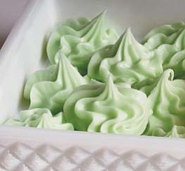Christmas cream cheese mint dainties are made with cream cheese, powdered sugar and a hint of flavoring.