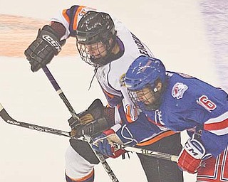 Daniel Renouf (11) and the Youngstown Phantoms will face off against Anthony Greco (16) and the Des Moines Buccaneers on Saturday in the second contest of a pivotal fi ve-game swing, which begins tonight in Green Bay, Wis., against the league-leading Green Bay Gamblers. With a record of 14-6-1 and 29 points, the Phantoms are in second place.