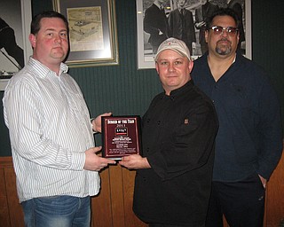 The Mahoning Valley Burger Review Board presents the 2011 Burger of the Year award to Sunrise Inn in Warren, Ohio. 