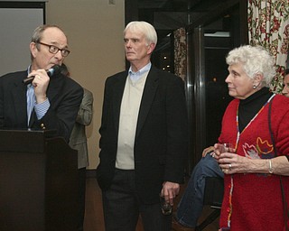 JESSICA M. KANALAS | THE VINDICATOR..Local golfer Jason Kokrak is the first Valley native in 30 years to make it to the PGA tour. Kokrak celebrated with friends and family at Trumbull Country Club. His PGA career will begin on Jan. 12. Bob Heltzel gestures to Kokrak's grandmother. Heltzel was Kokrak's coach at Warren JFK. Behind them was the team's other coach, Bob Todd.