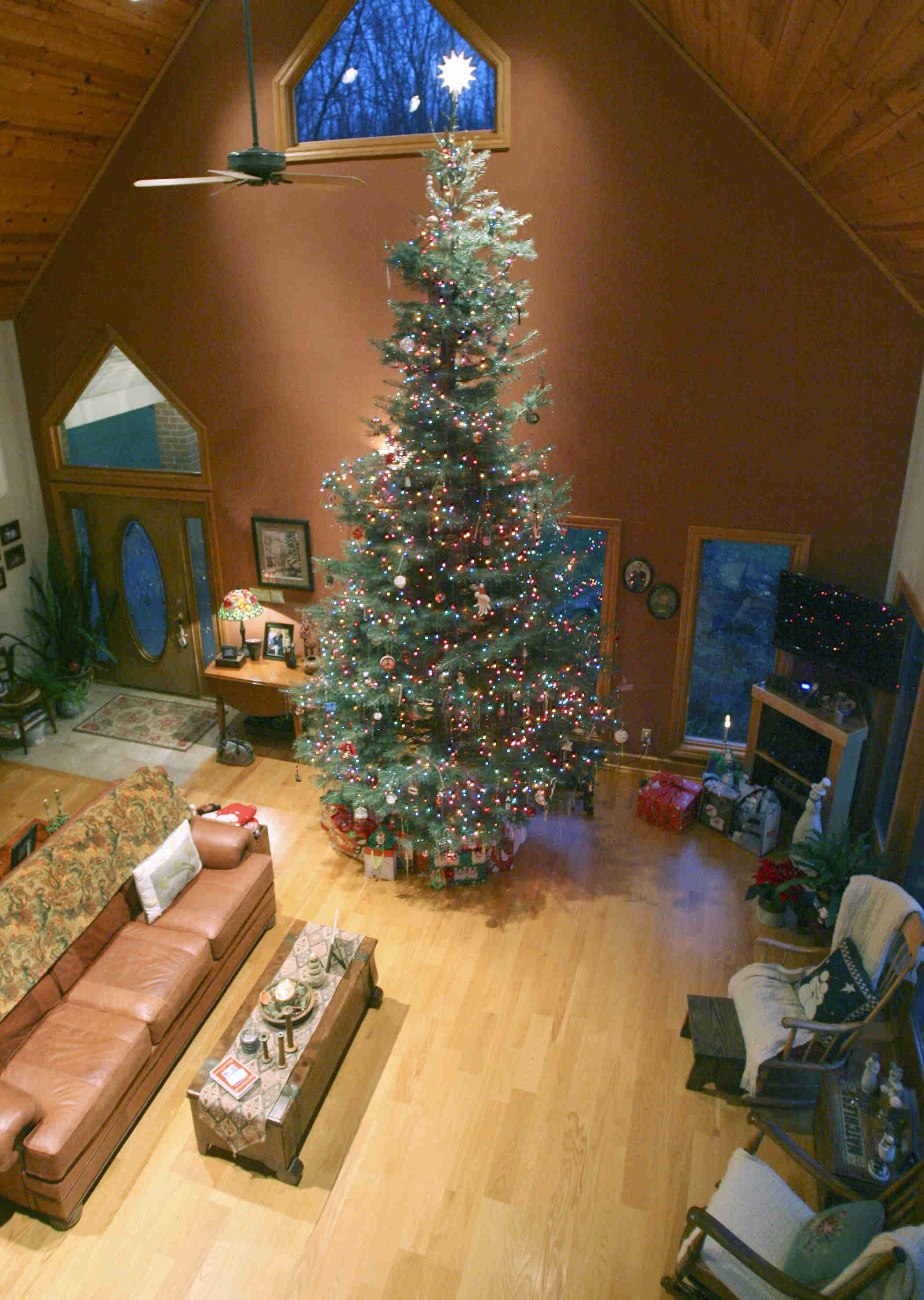 JESSICA M. KANALAS | THE VINDICATOR
Paula and Frank Dietz's 18-foot Christmas tree sits in the great room of their Springfield Township home, which boasts a 24-foot-high ceiling. 